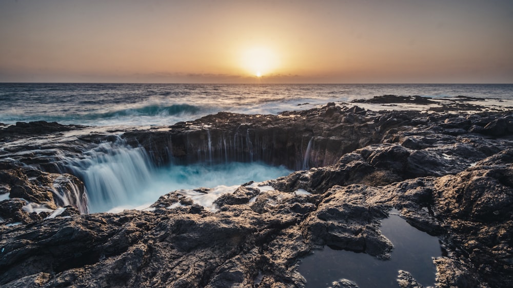 a large body of water surrounded by rocks