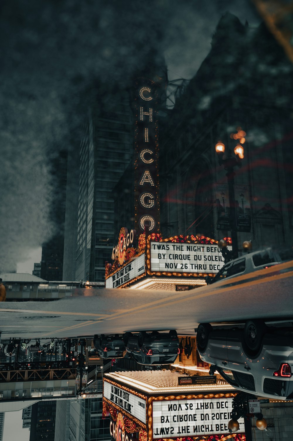 the chicago theater marquee is lit up at night