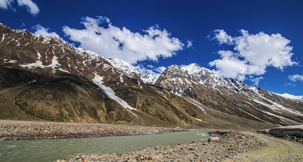 a mountain range with a river running through it