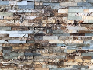 a close up of a wall made of stone