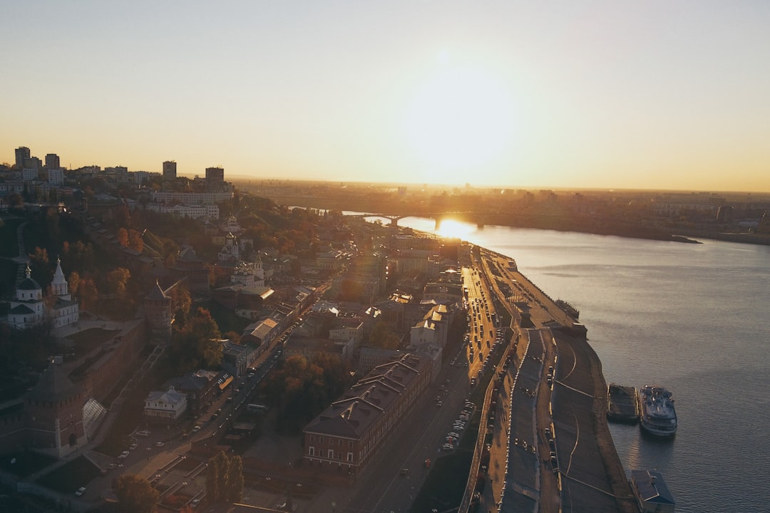 a large body of water with a city in the background,