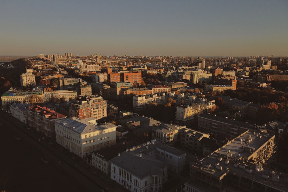 an aerial view of a city with tall buildings