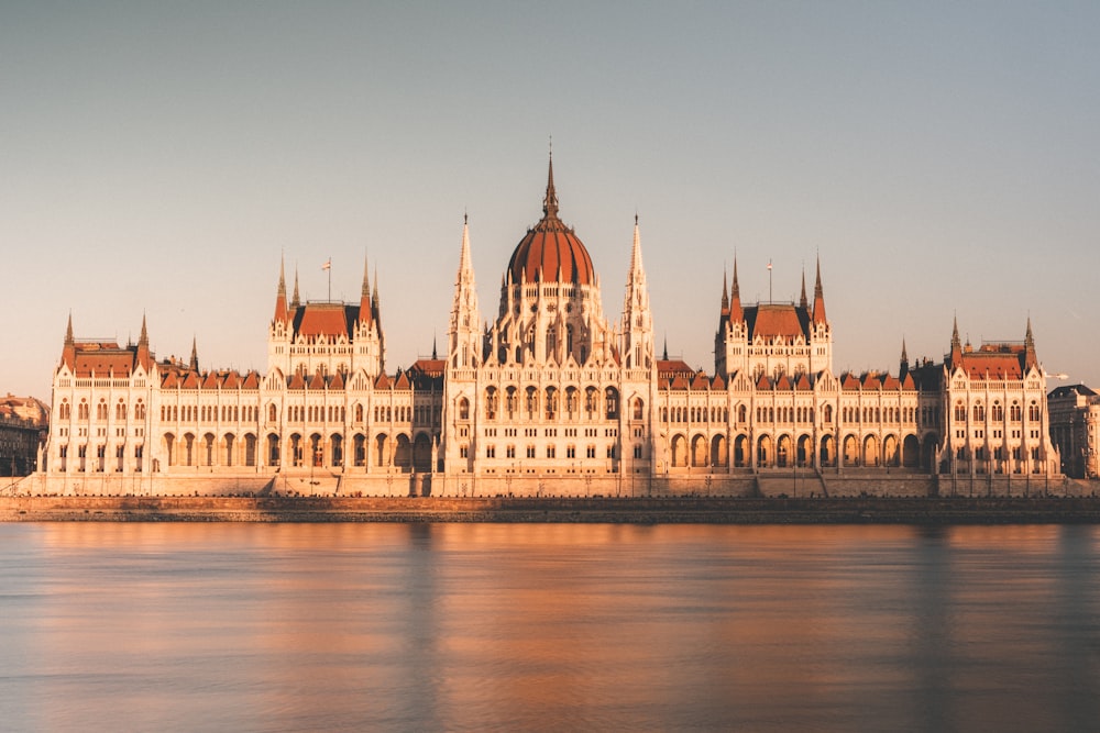 a large building sitting on top of a body of water