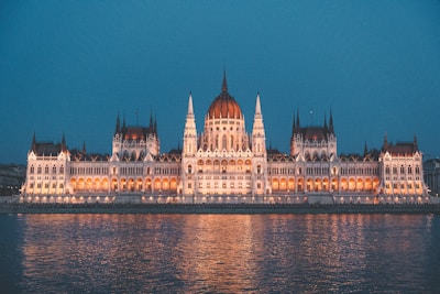a large building that is next to a body of water