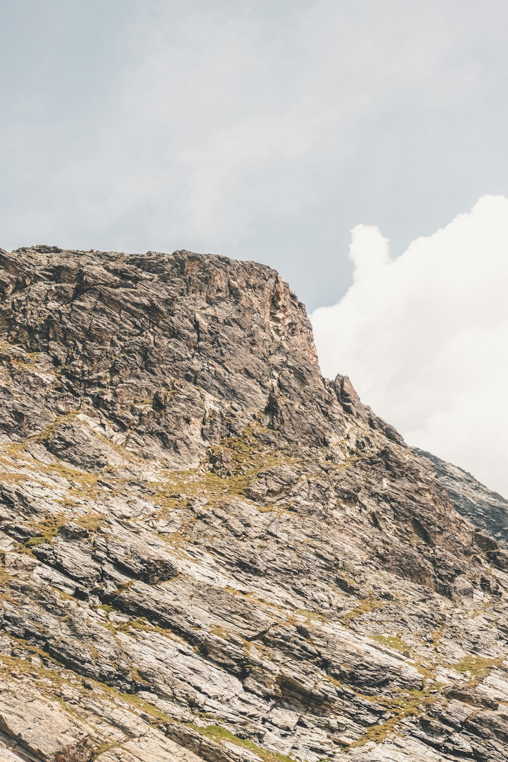 a man standing on top of a rocky mountain