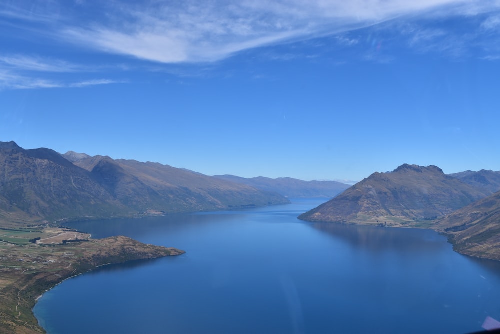 a large body of water surrounded by mountains