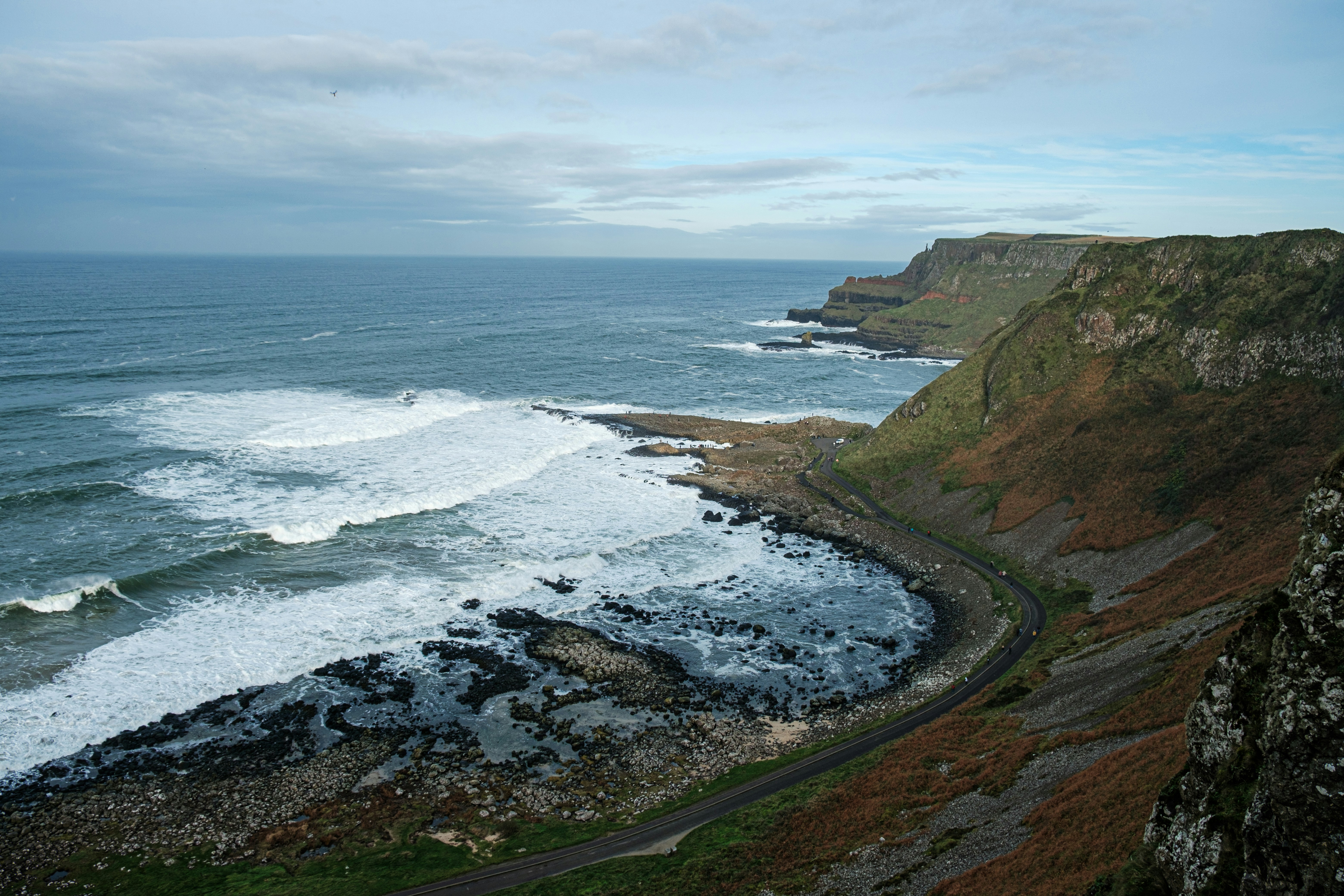 a view of the ocean from a high cliff