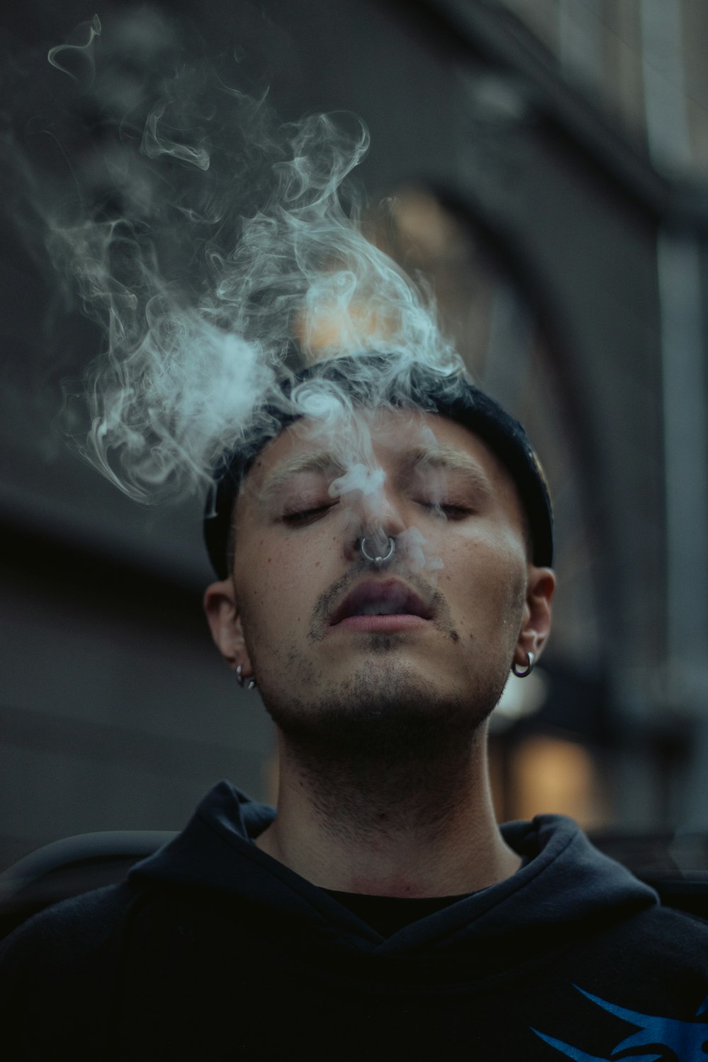 a man with smoke coming out of his head