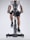 A person dressed in athletic gear is actively pedaling on a stationary exercise bike, with a focus on their lower body and cycling position. The background is minimalistic, highlighting the exercise equipment and individual.