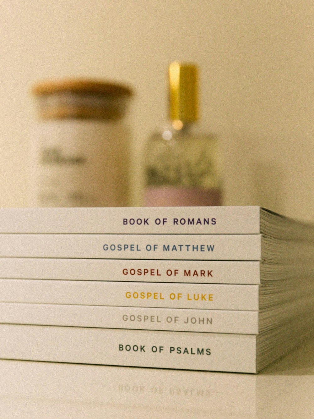 a stack of books sitting on top of a table