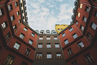 looking up at a building from the ground
