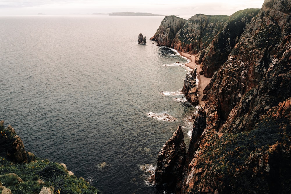 a view of the ocean from the top of a mountain