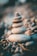 a stack of rocks sitting on top of a rocky beach