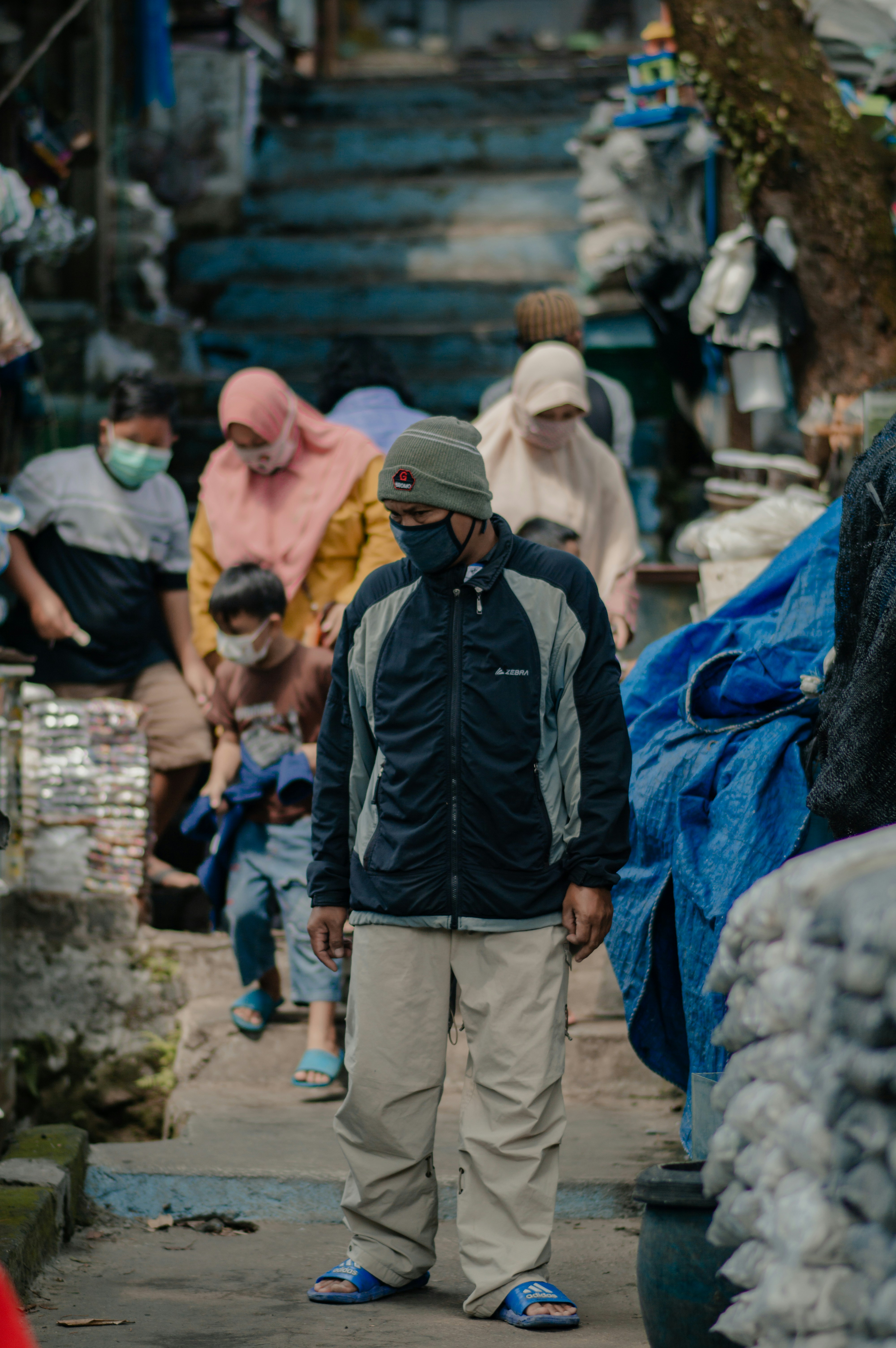a group of people walking down a street