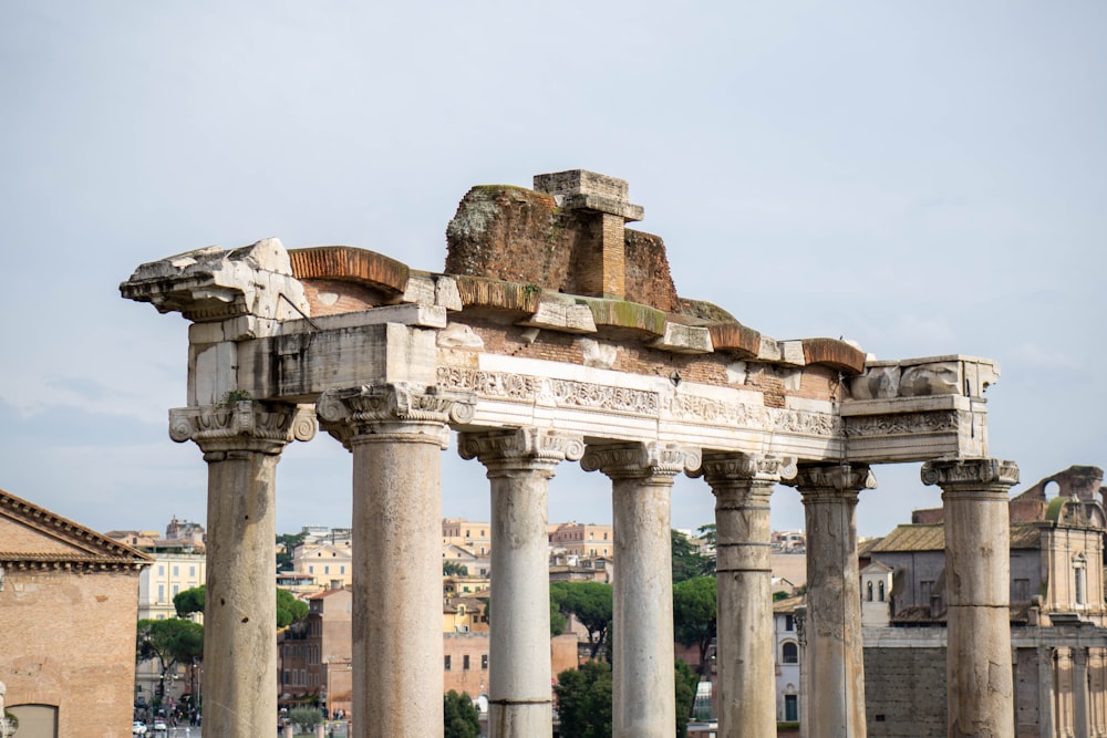 a group of stone pillars sitting next to each other