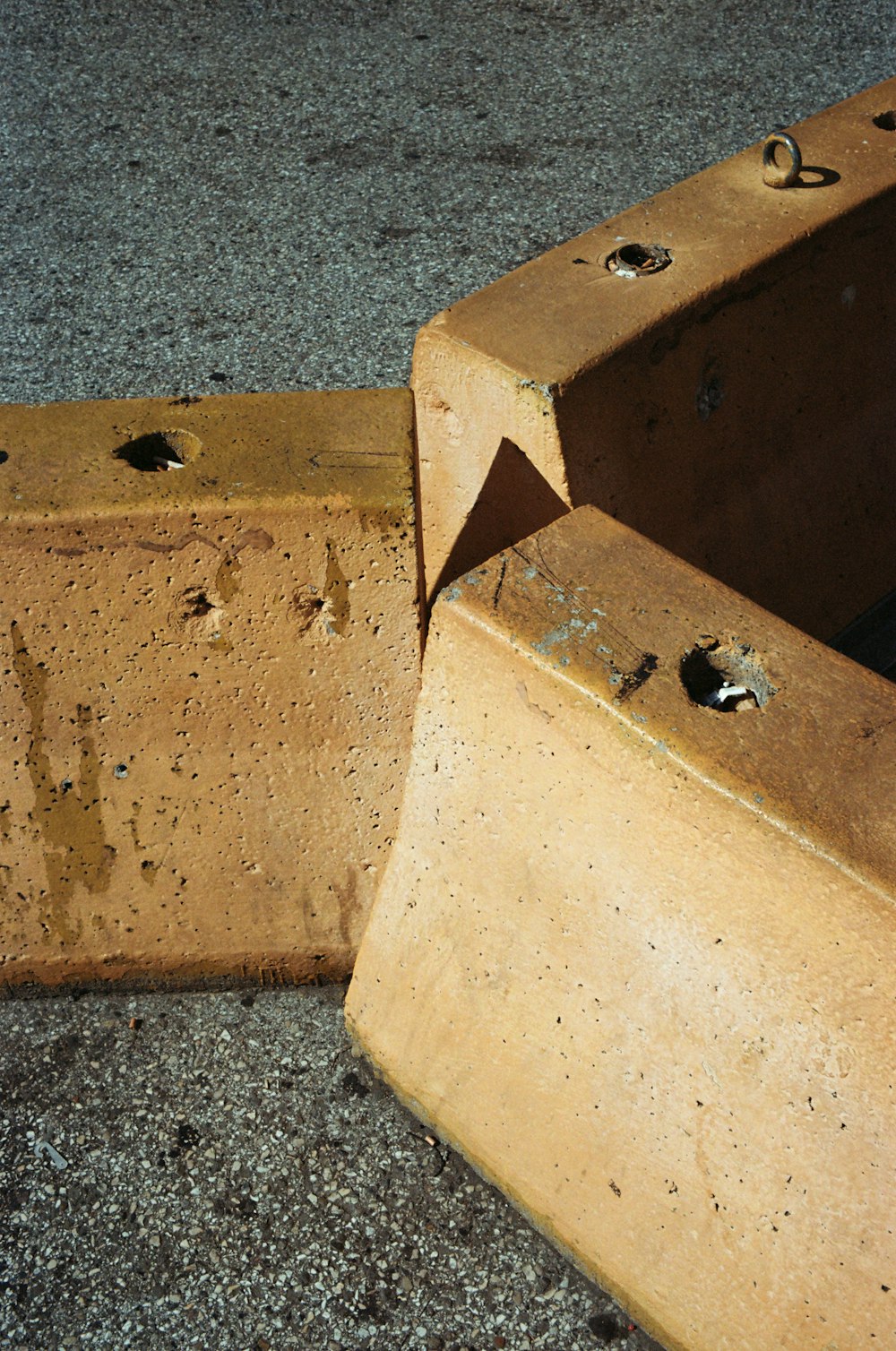 a close up of a cement block with holes in it