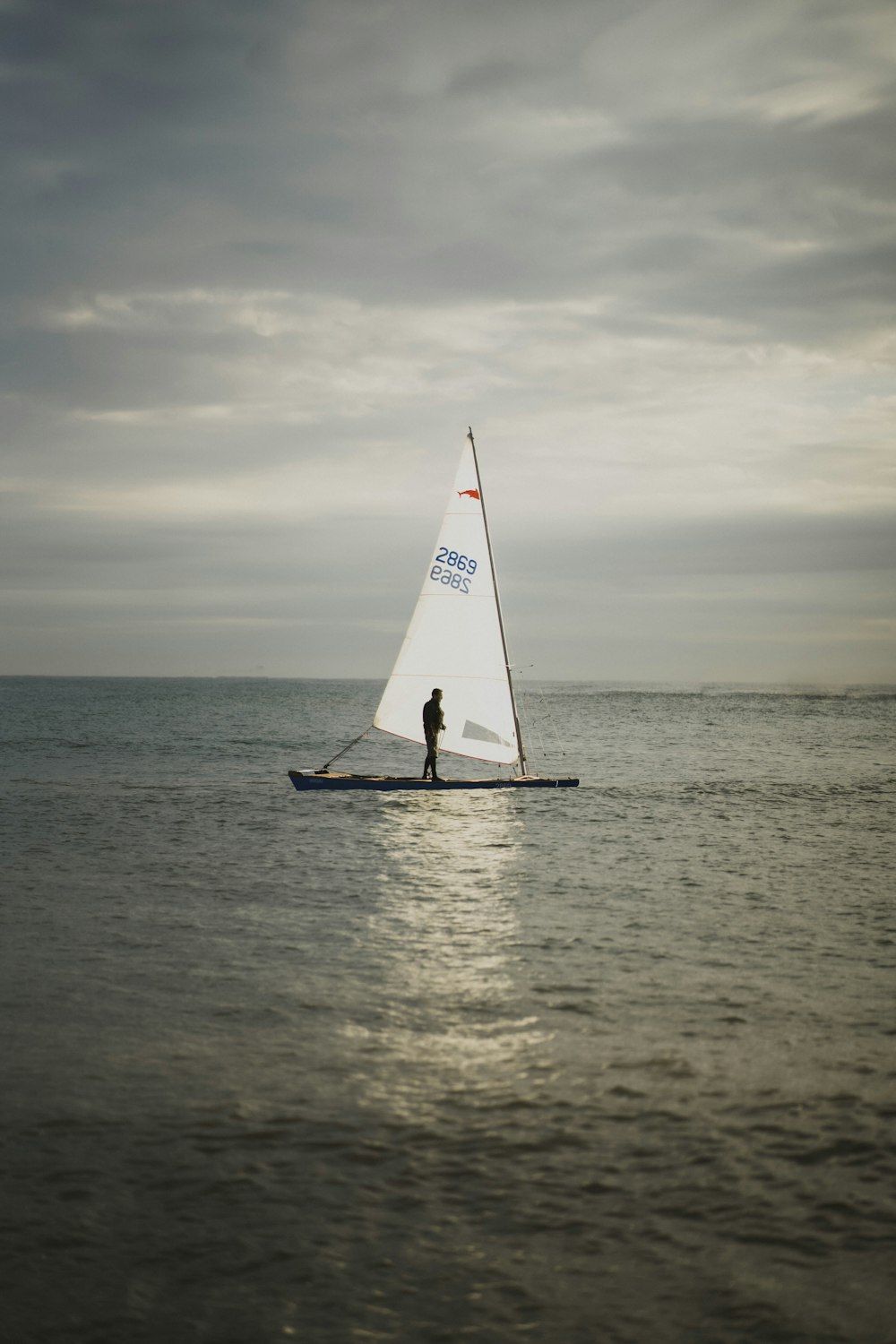 a boat on a body of water next to the ocean