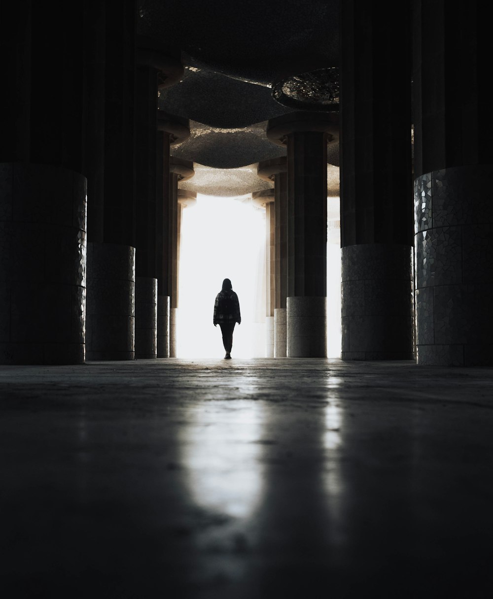 a person standing in front of a building