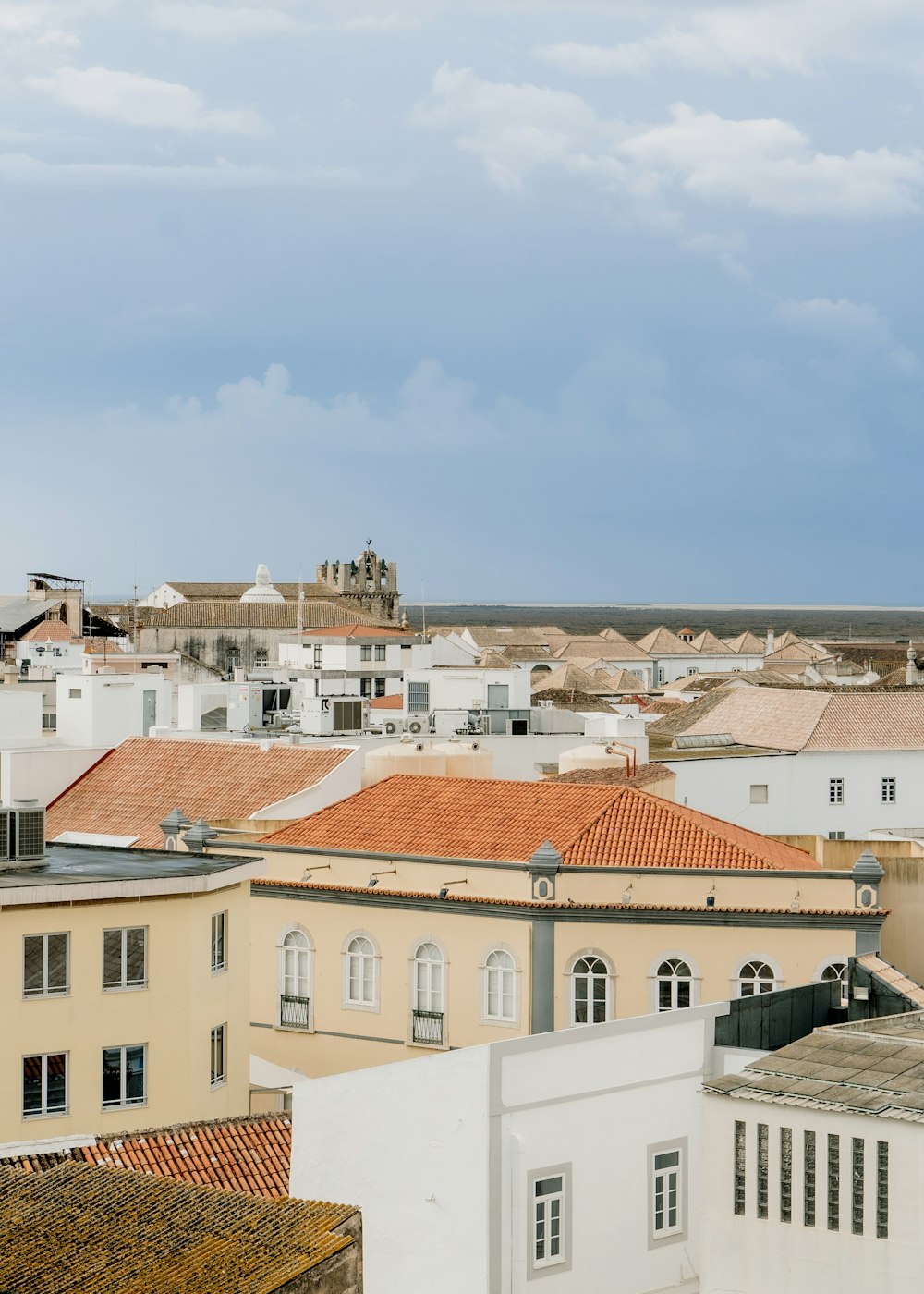 a view of a city from the roof of a building