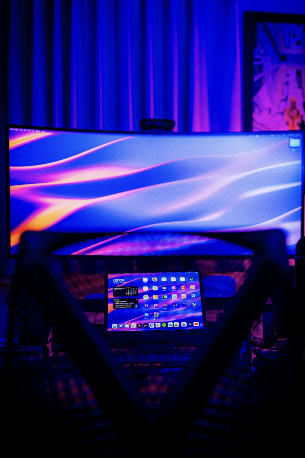 a computer monitor sitting on top of a desk