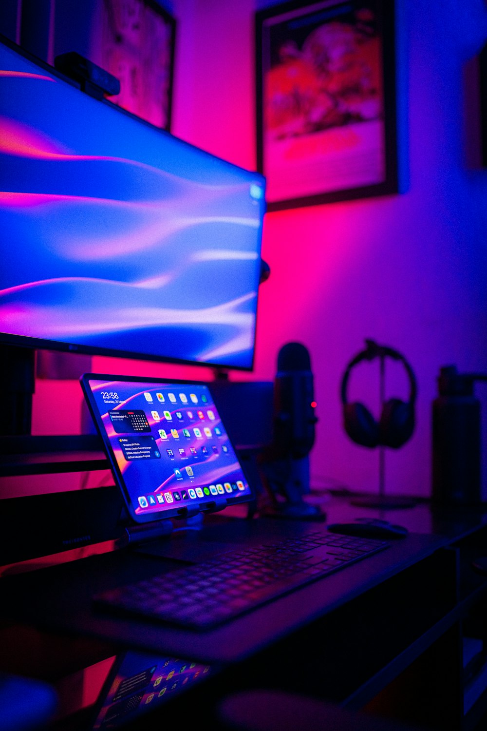 a laptop computer sitting on top of a desk