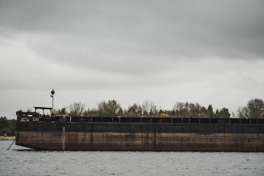 a large cargo ship in the middle of a body of water