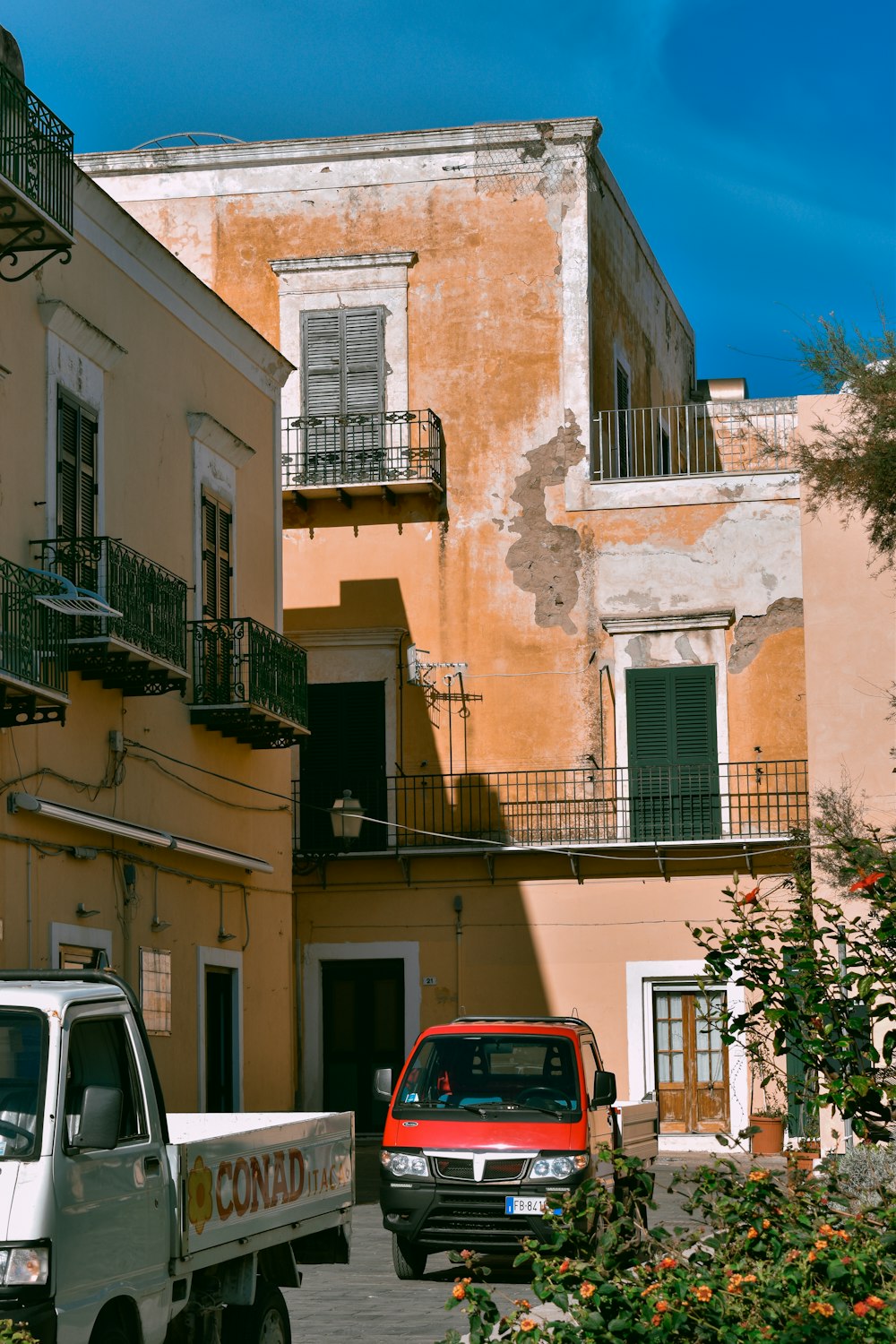 a truck is parked in front of a building