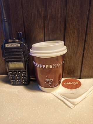 Handheld radio and coffee