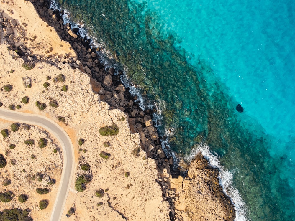 an aerial view of a beach and the ocean