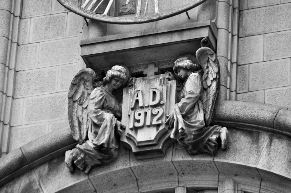 a clock mounted to the side of a building