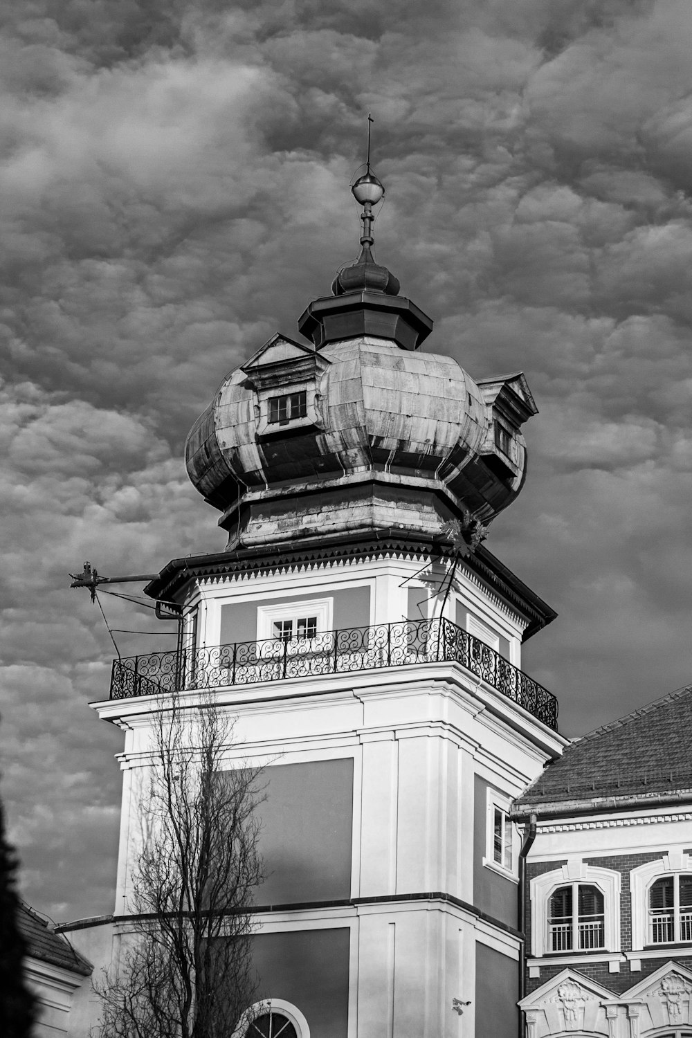 a black and white photo of a clock tower