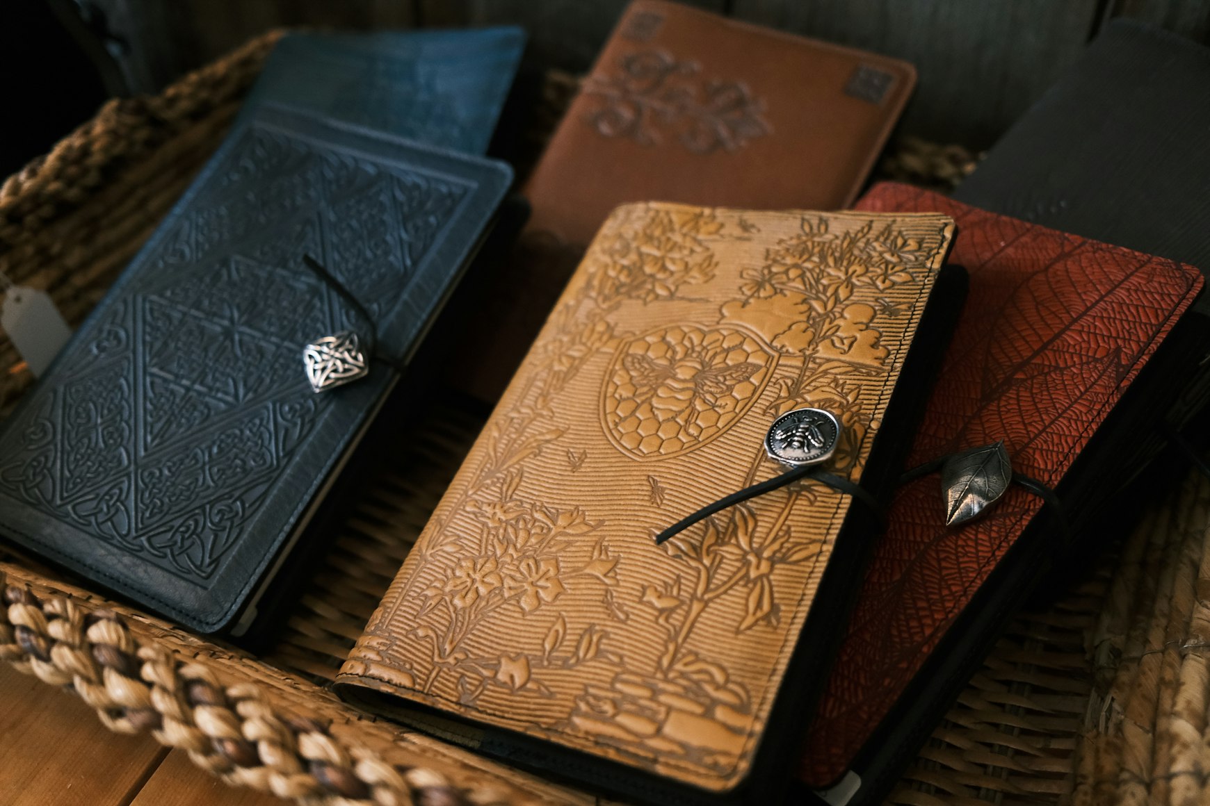 Embossed leather journals displayed on a table