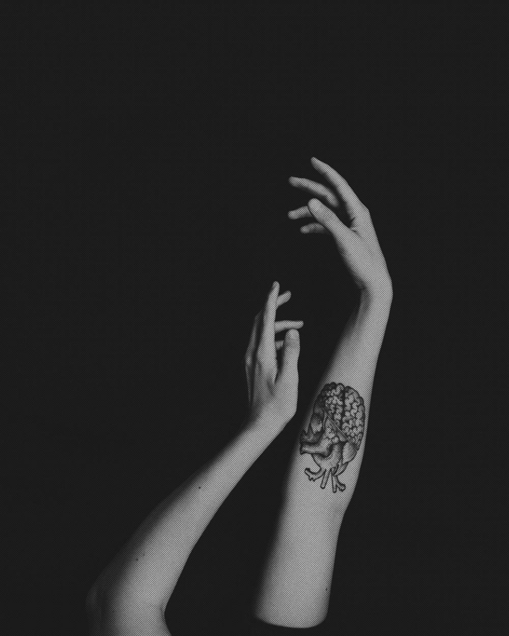 a woman's arm with a tattoo on it