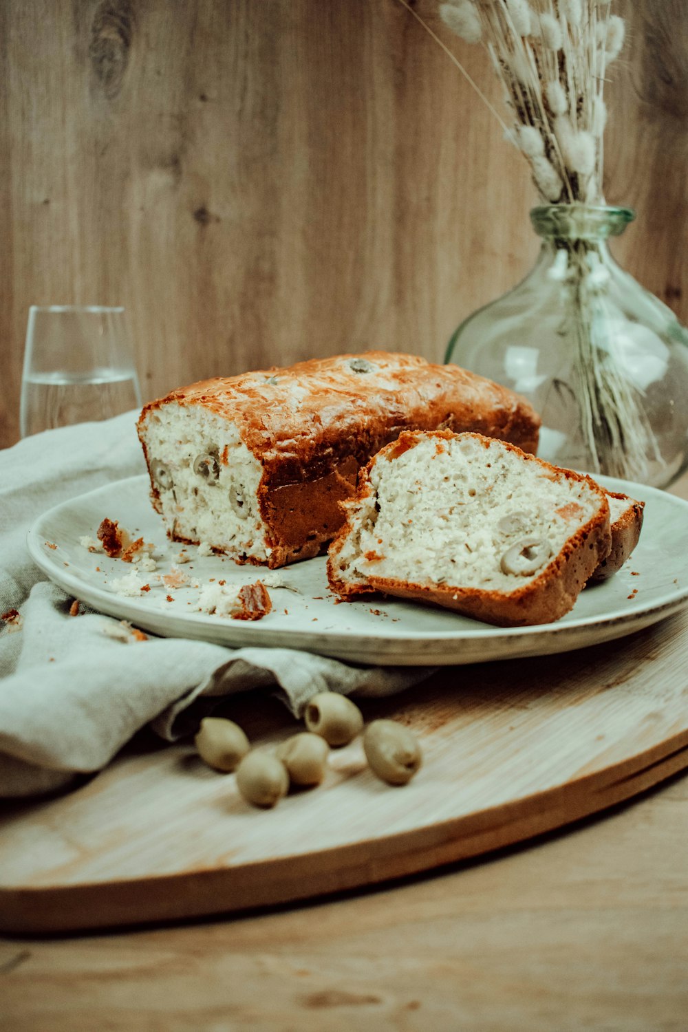 a loaf of bread sitting on top of a white plate