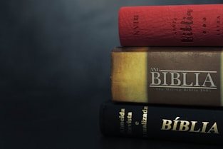 three books stacked on top of each other