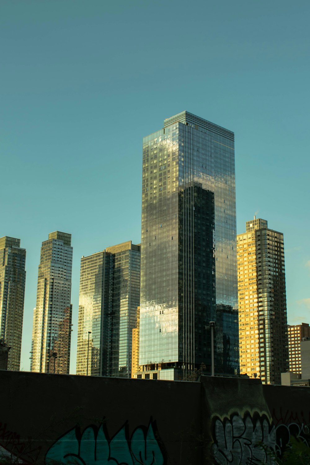 a view of a city skyline with tall buildings