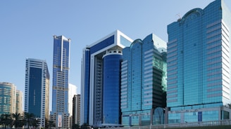 a group of tall buildings sitting next to each other
