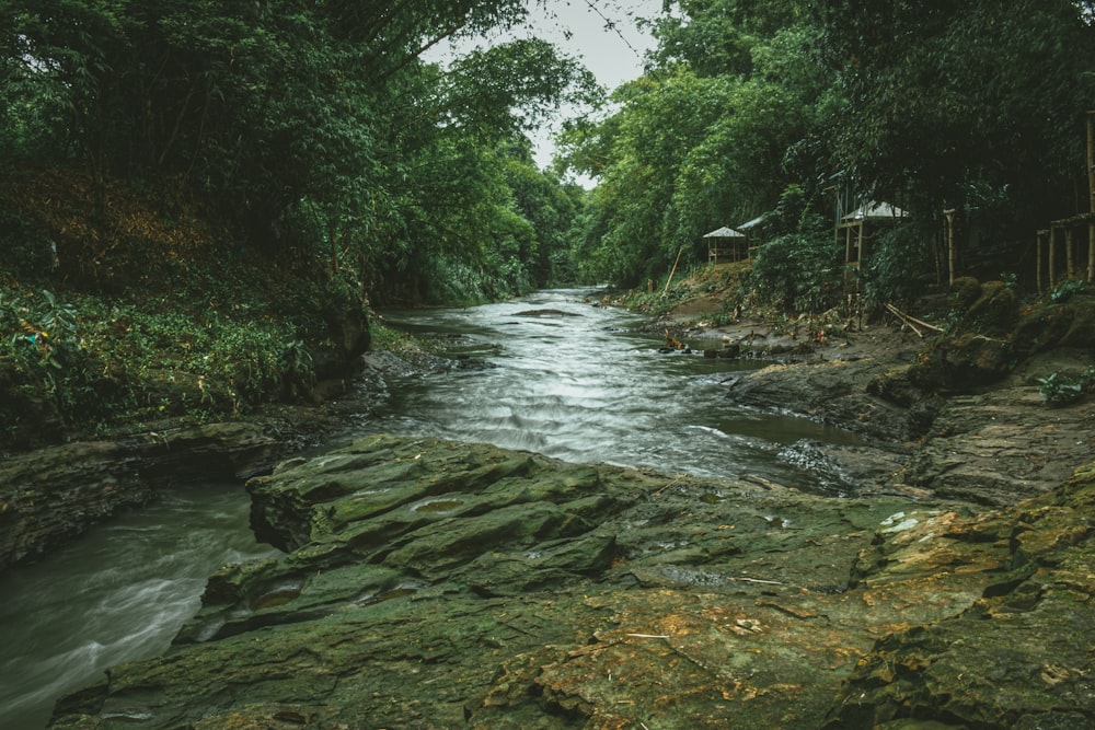 a large waterfall over a body of water