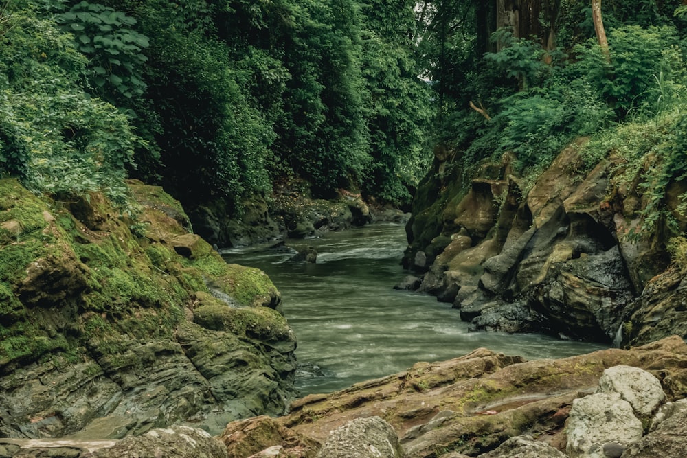 a large waterfall over a rocky cliff