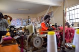 a group of women working on sewing machines