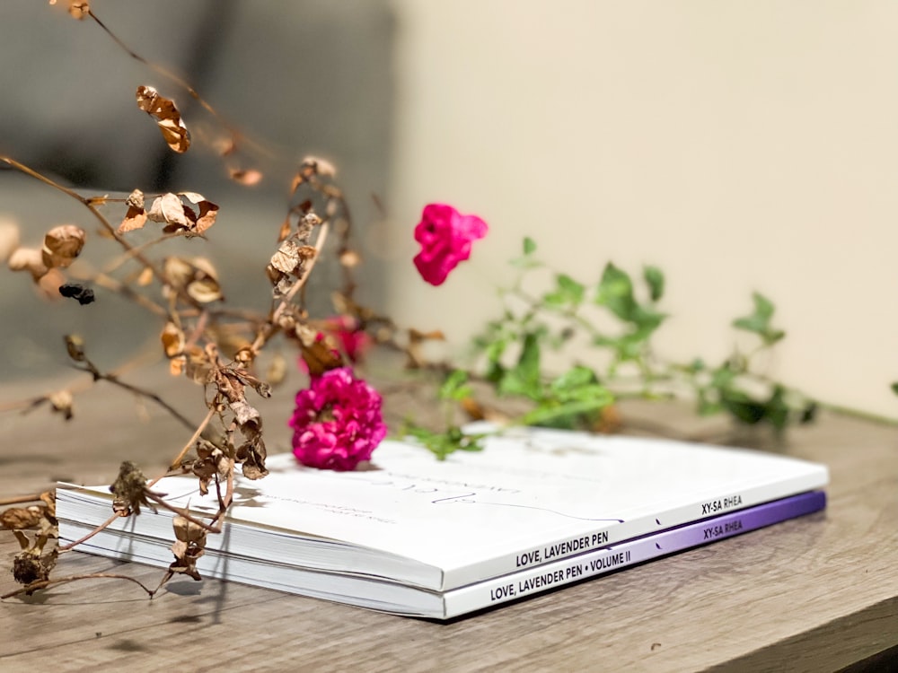 a book sitting on top of a wooden table