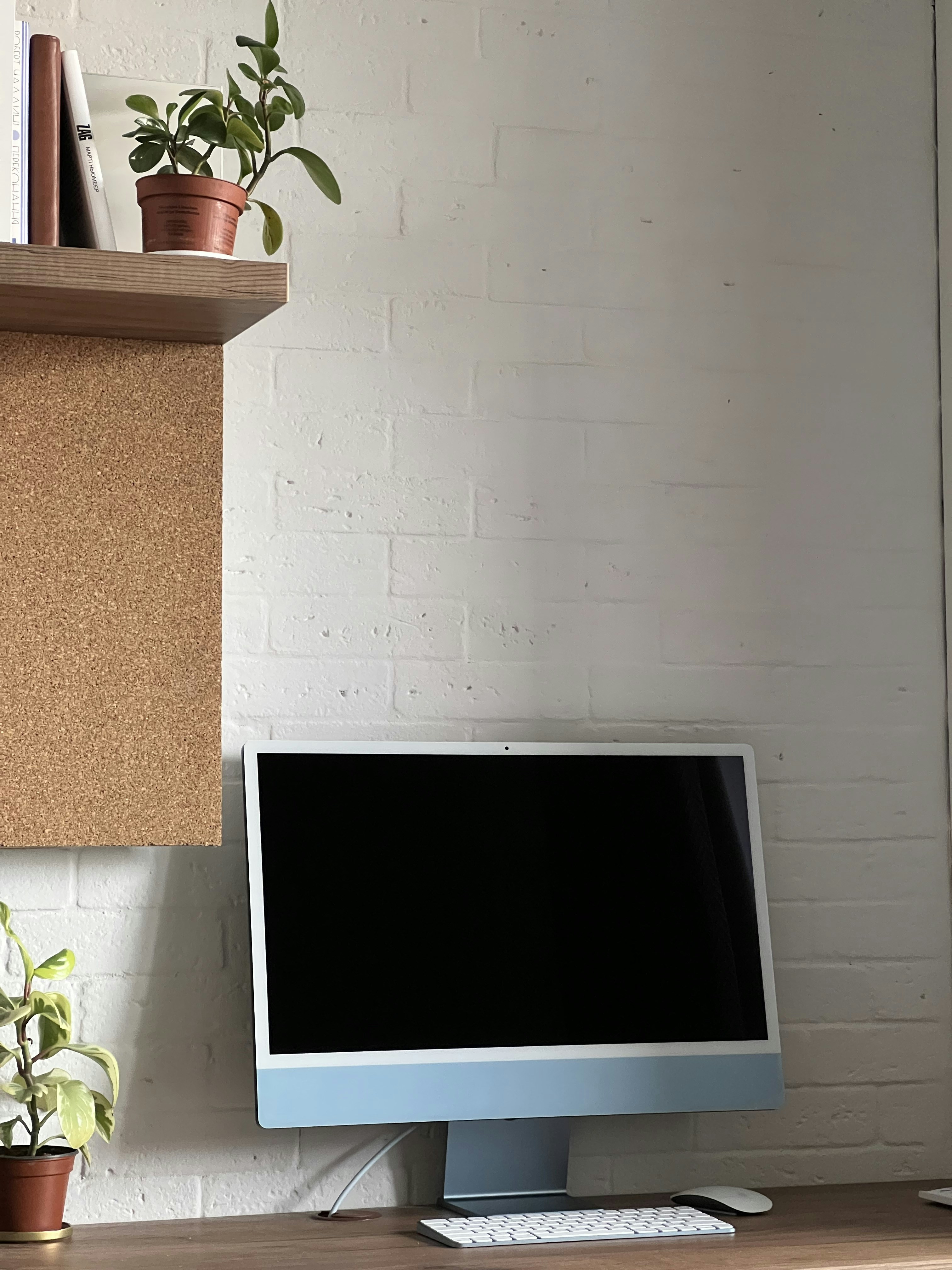 An IPTV box with HDMI cable beside a TV