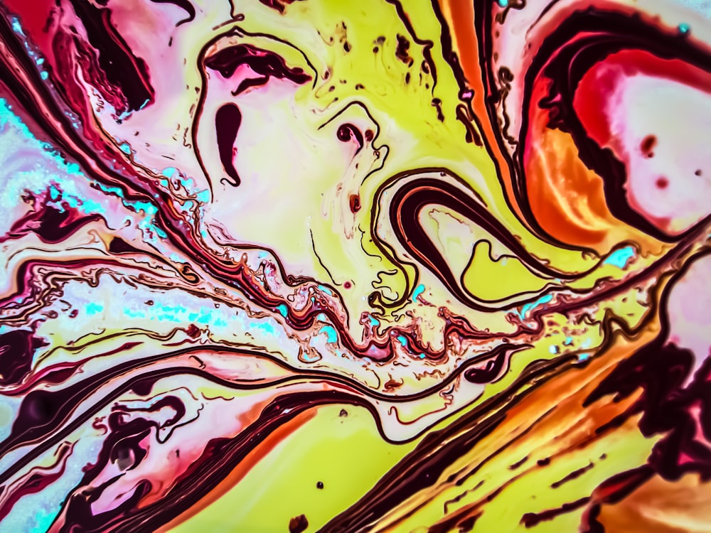 a close up of a colorful liquid substance