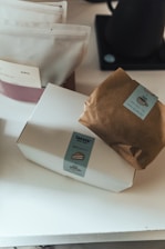 a brown paper bag sitting on top of a white counter