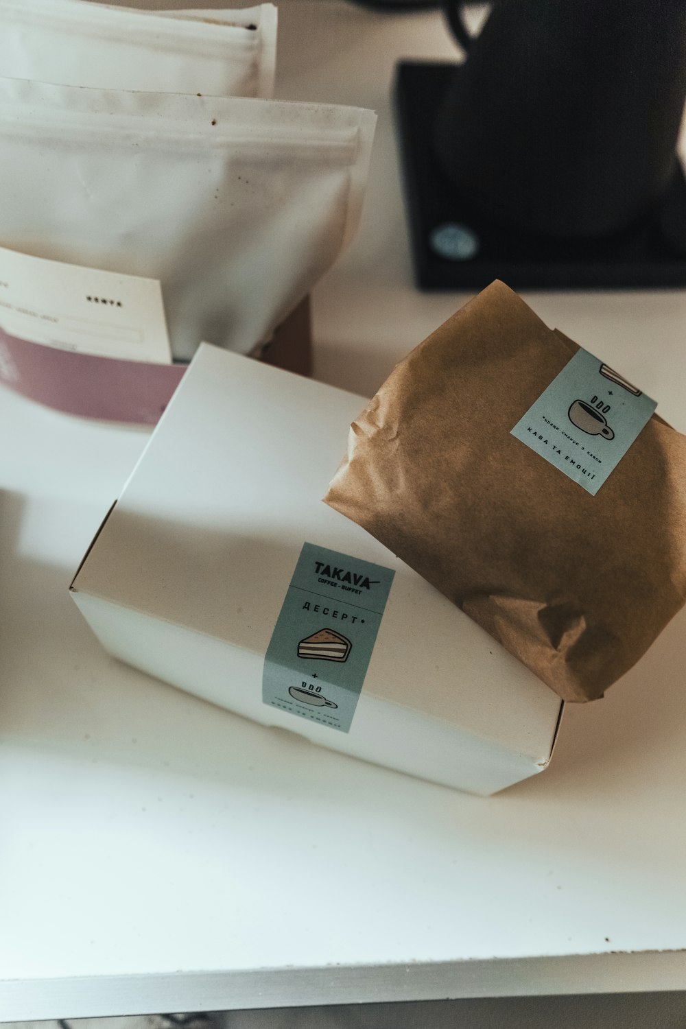 a brown paper bag sitting on top of a white counter