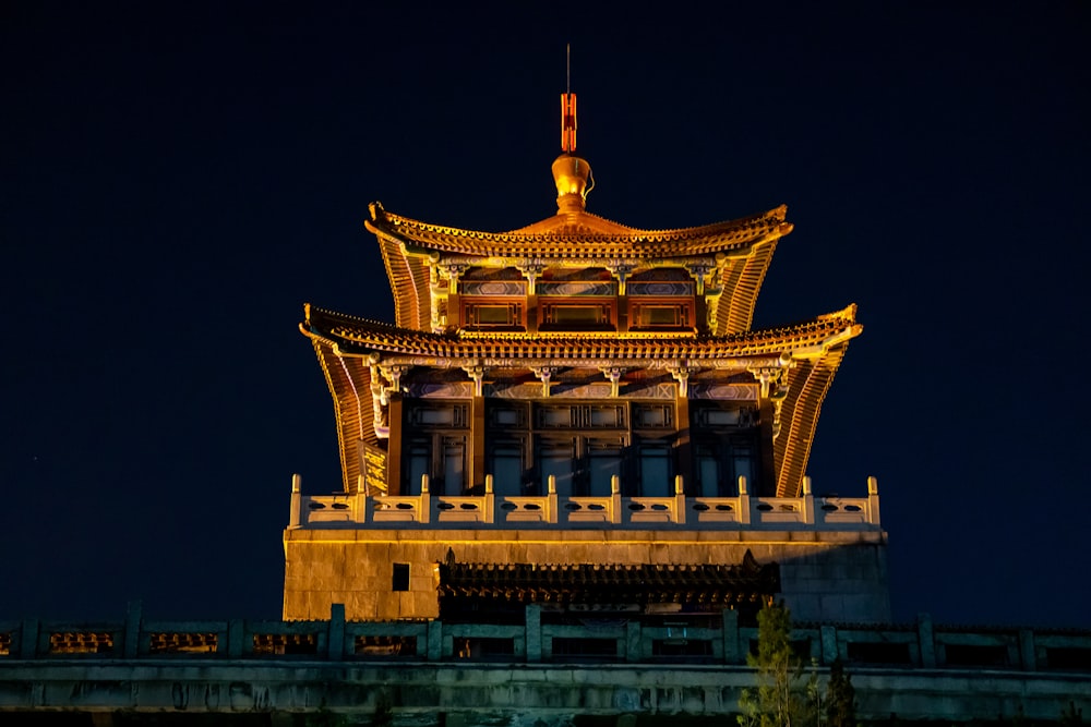 a tall tower with a clock on top of it