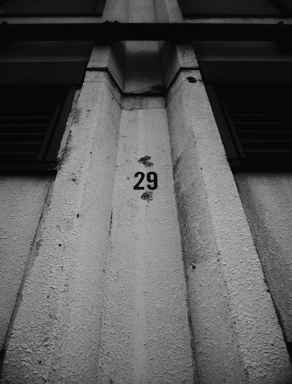 a building with a number 29 painted on the side of it
