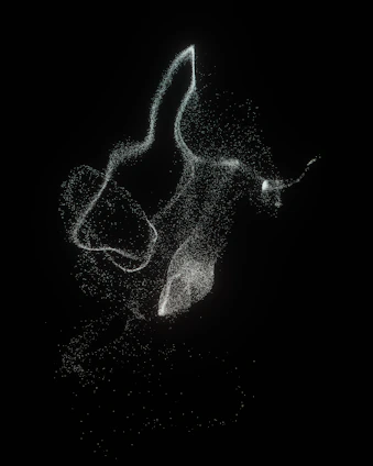 Abstract human silhouette formed by glowing particles against a dark, flowing particle background.