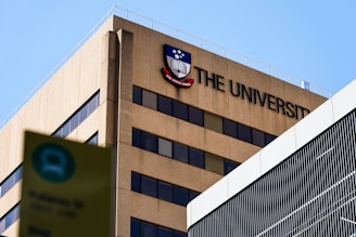 a building with a sign that says the university on it