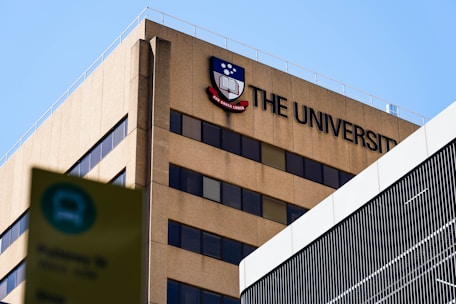 a building with a sign that says the university on it